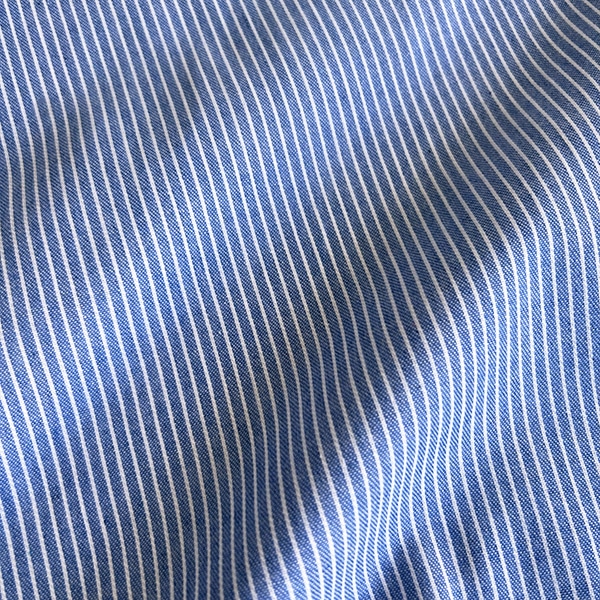 tela de algodón rayas finas blancas azul
