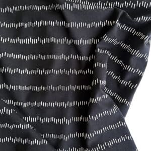 Tela Punto Camiseta – ‘Stripes on the move’ – Negro