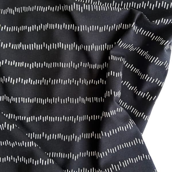 Tela Punto Camiseta – ‘Stripes on the move’ – Negro