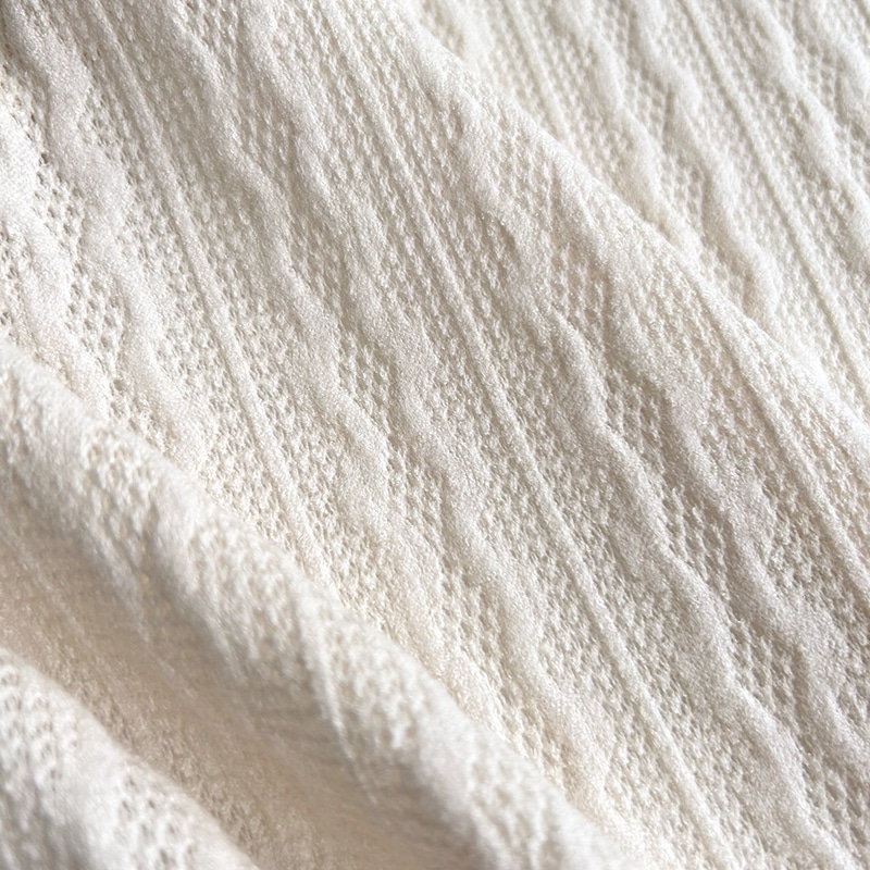 tela de punto tricot wave blanco roto